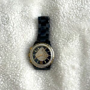 Michael Kors black gold with false diamonds… Slightly used… Needs new battery